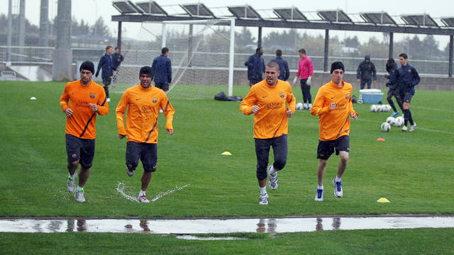 Entrenament sota la pluja del primer equip de futbol / FOTO: MIGUEL RUIZ - FCB
