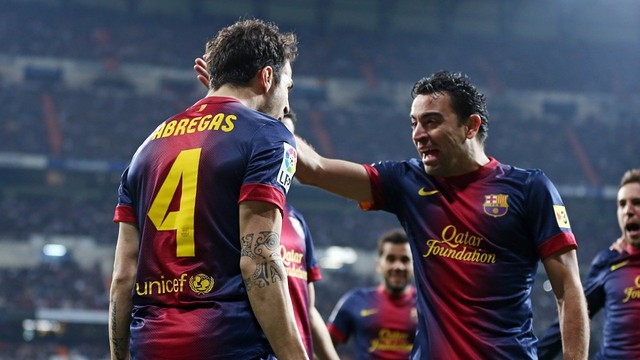 Cesc celebrates his go-ahead goal with Xavi. PHOTO/ Miguel Ruiz - FCB
