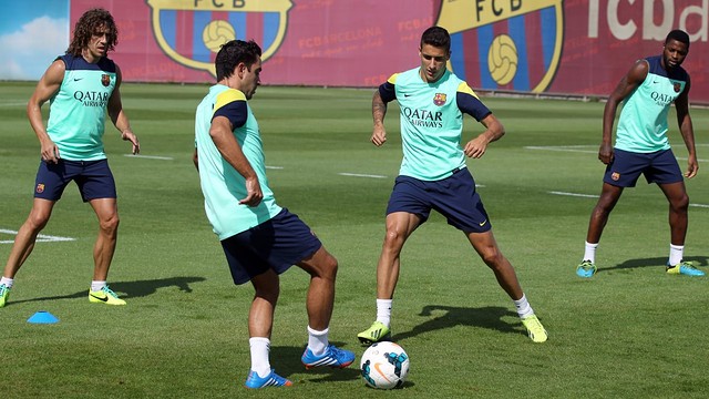 Puyol, Xavi, Tello and Song in an archive photo in training / PHOTO: MIGUEL RUIZ - FCB