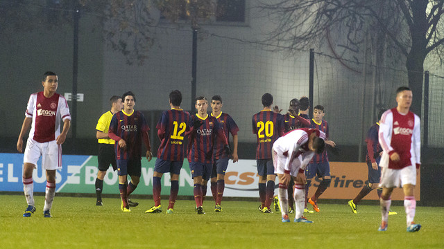 The Juvenil A players celebrate one of tonight's four goals in Amsterdam